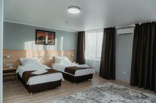 Отель Aral Hotel Аральск Двухместный номер Делюкс с 2 отдельными кроватями-6
